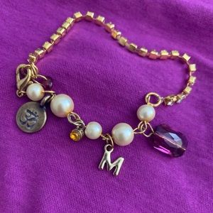Vintage Gold tone charm bracelet with ‘M’ and ‘OM